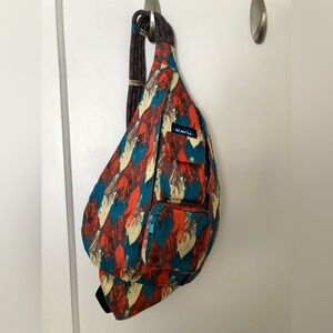 KAVU Unisex Rope Sling Backpack Bag Pheonix Feather VGC